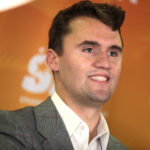 Charlie Kirk speaking with attendees at the 2019 Student Action Summit hosted by Turning Point USA at the Palm Beach County Convention Center in West Palm Beach, Florida. Credit photo : Flickr Gage Skidmore
